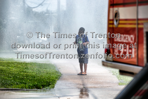 Trenton firefighters provide cooling rain for locals