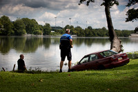 Woman rescued from car in river