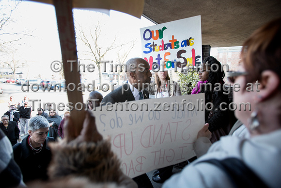 Crowd protests the closing of Stokes Early Childhood Center