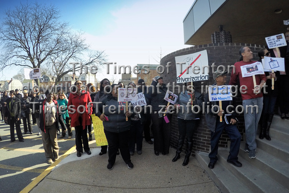 Crowd protests the closing of Stokes Early Childhood Center