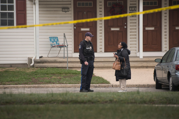 Police investigate shooting scene in  Hamilton Estates apartment
