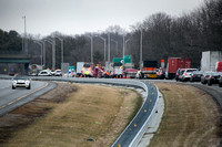Crash involving tractor trailer, multiple vehicles jams I-95 tra