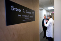 Chief judge travels from Australia for local eye surgeon
