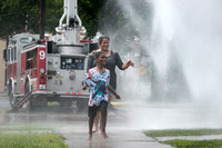 Trenton firefighters provide cooling rain for locals