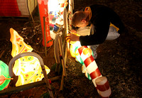 Hamilton's Bob Martel lights up Christmas decorations at his home, Nov. 25, 2011