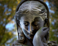 Faces of angels at Riverview Cemetery